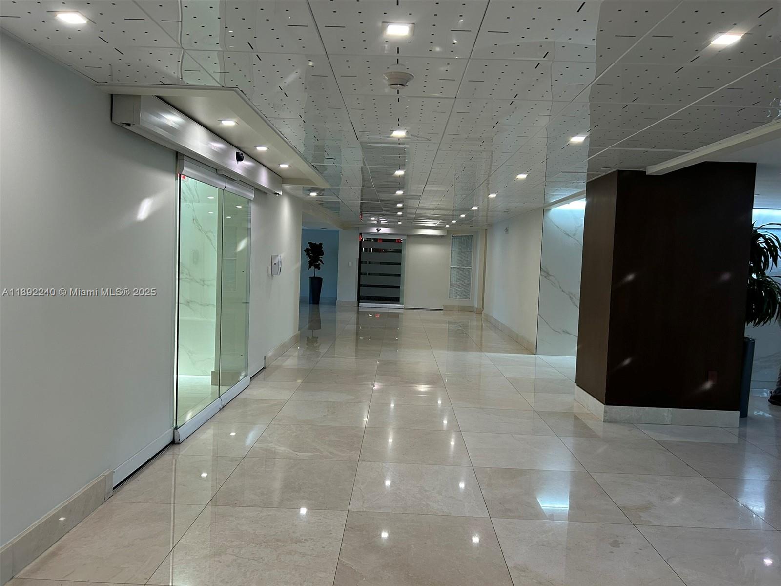 540 Brickell Key Drive, Unit 1602 Miami, FL 33131 - Photo 5 of 61 a view of a hallway