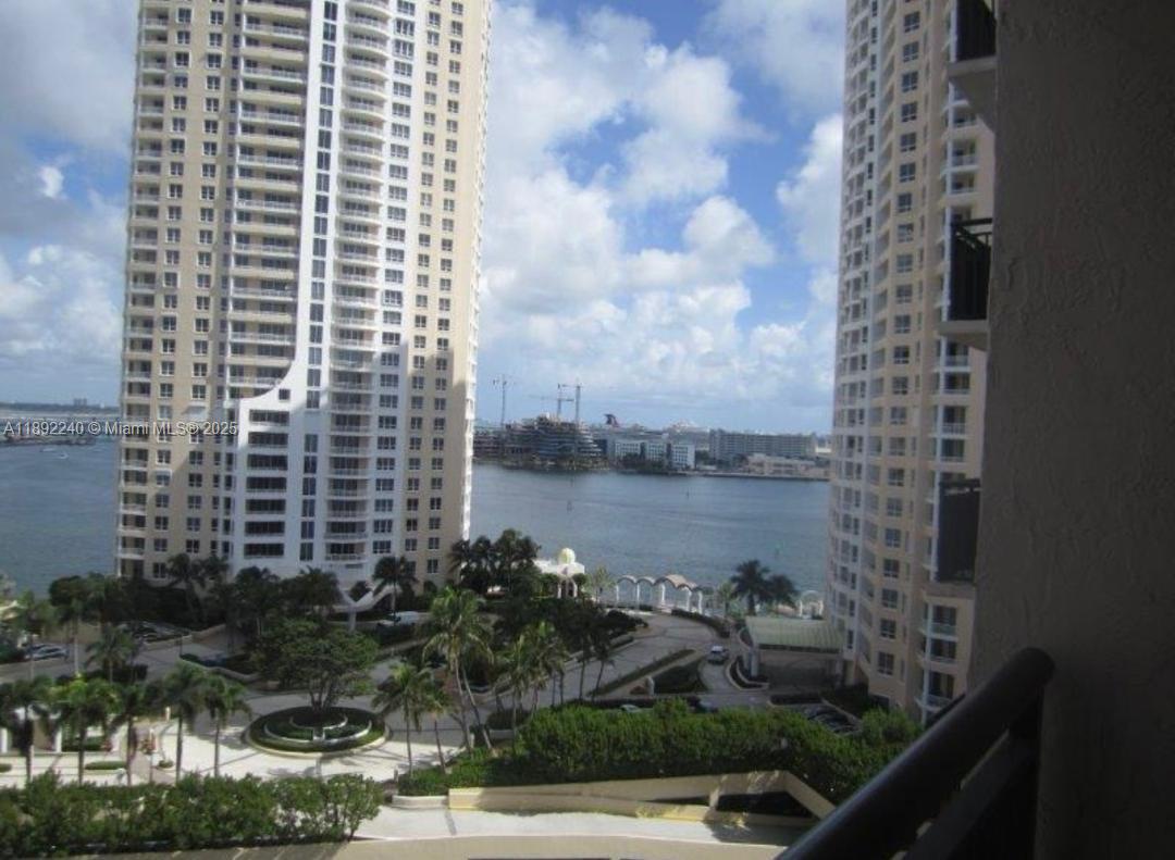 540 Brickell Key Drive, Unit 1602 Miami, FL 33131 - Photo 60 of 61 Living room and bedroom.