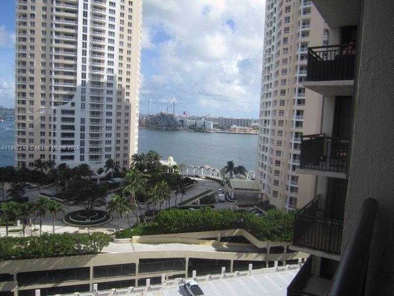 540 Brickell Key Drive, Unit 1602 Miami, FL 33131 - Photo 61 of 61 a view of balcony with yard and outdoor seating