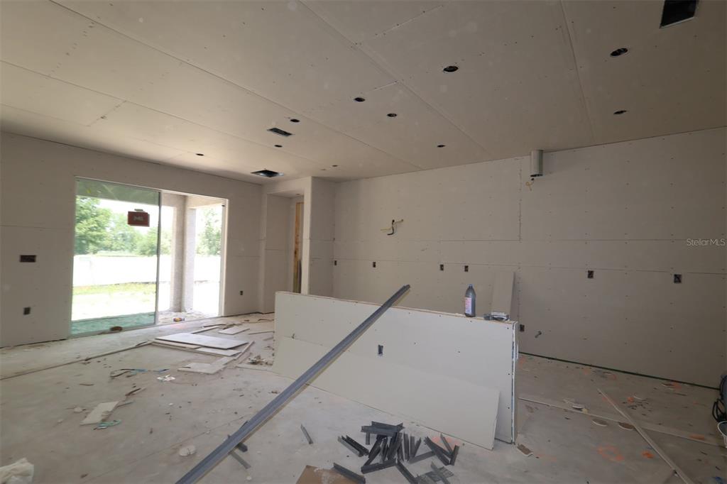 3850 Wolves Crk Place Apopka, FL 32712 - Photo 6 of 11 a view of a livingroom with a window