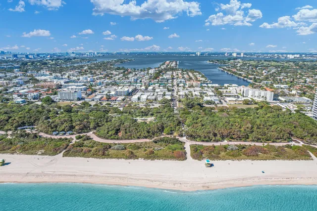 a view of a dining room with furniture and stairs