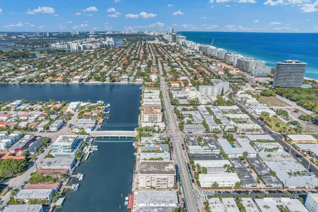 a bed room with a bed and a television
