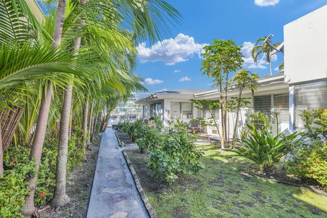 a living room with furniture and a gate
