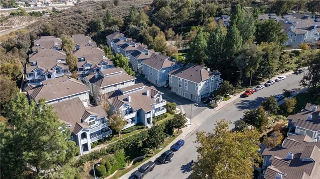 an aerial view of a city with lots of residential buildings