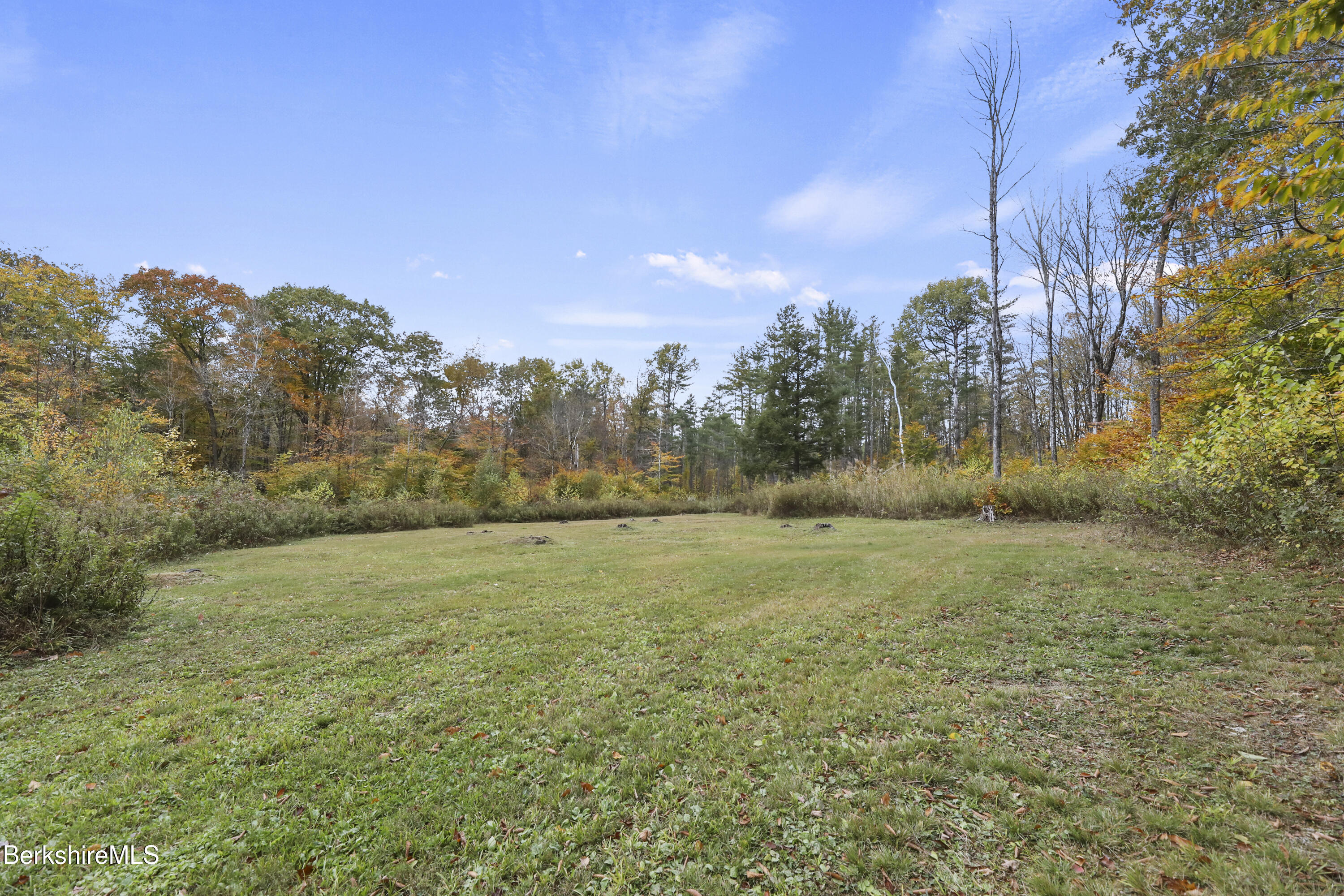 Lot 301 Cascade Street Pittsfield, MA 01201 - Photo 9 of 27 a view of a field with trees in the background
