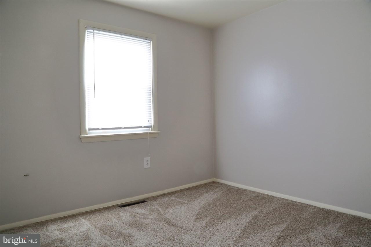924 Hanover Road York, PA 17408 - Photo 13 of 20 an empty room with a window