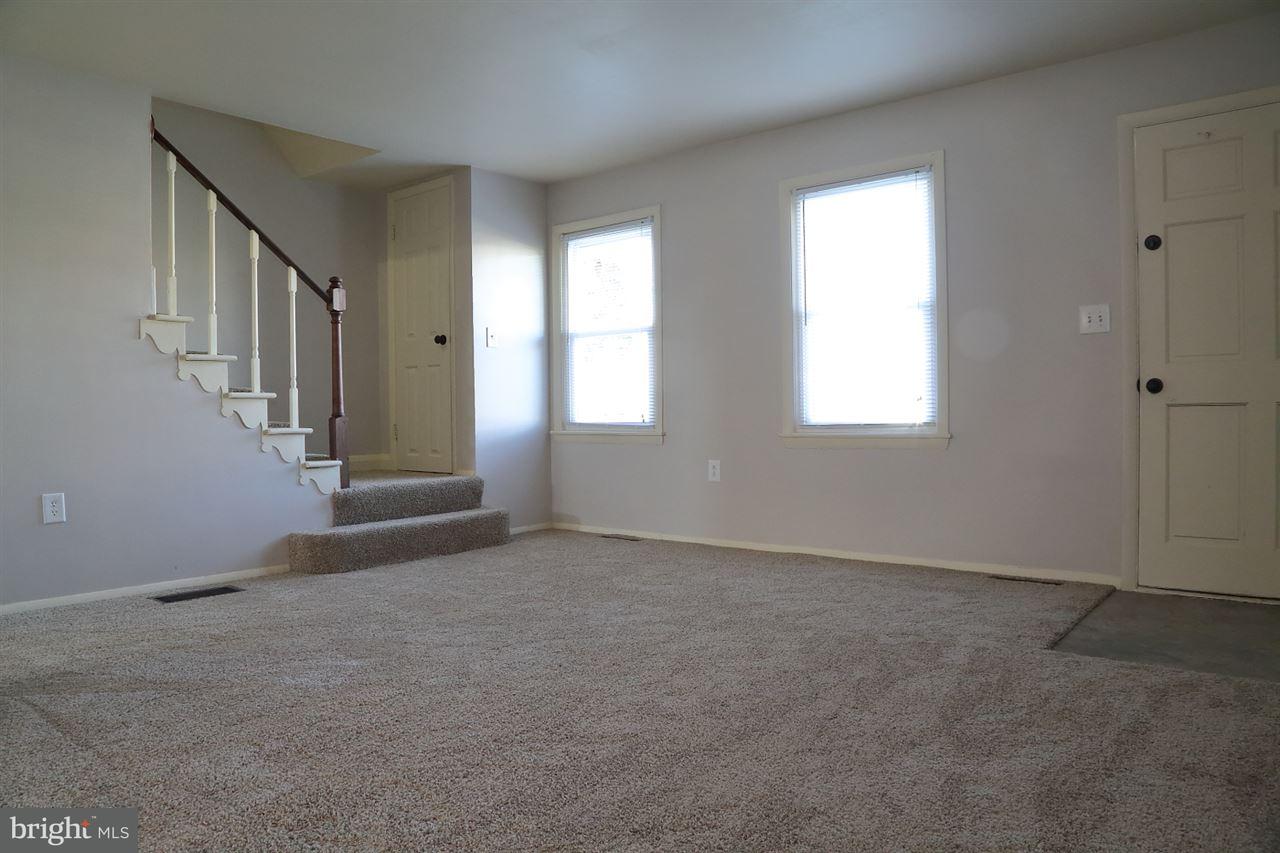 924 Hanover Road York, PA 17408 - Photo 9 of 20 an empty room with windows
