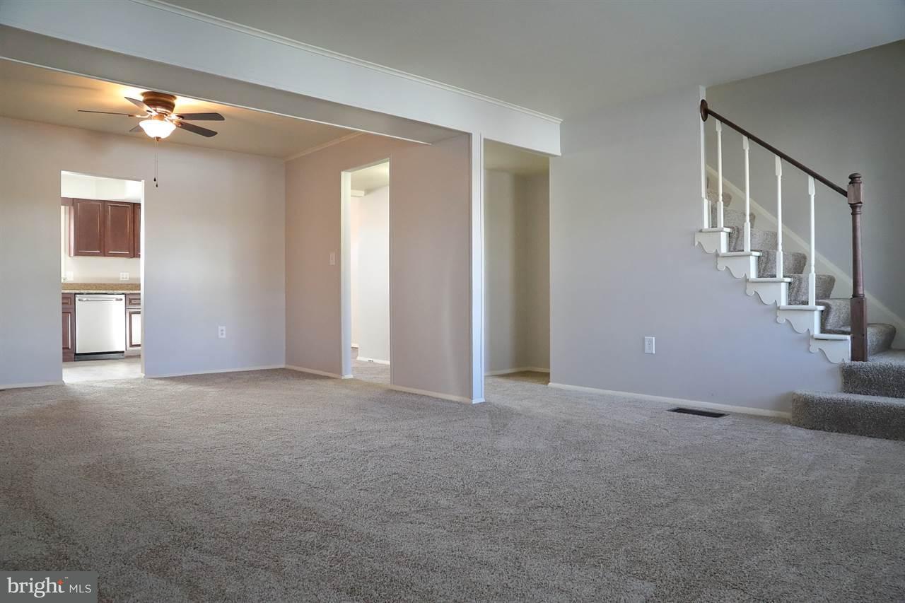924 Hanover Road York, PA 17408 - Photo 10 of 20 a view of an empty room with stairs
