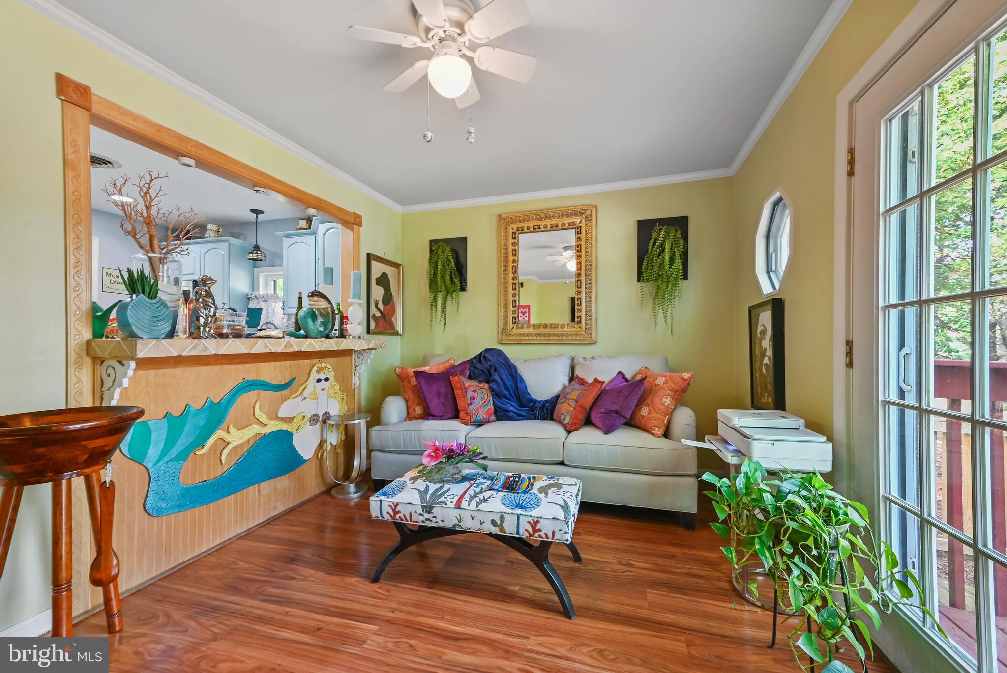 122 Sandyhook Road Ocean Pines, MD 21811 - Photo 12 of 16 a living room with furniture and painting on the wall next to a window