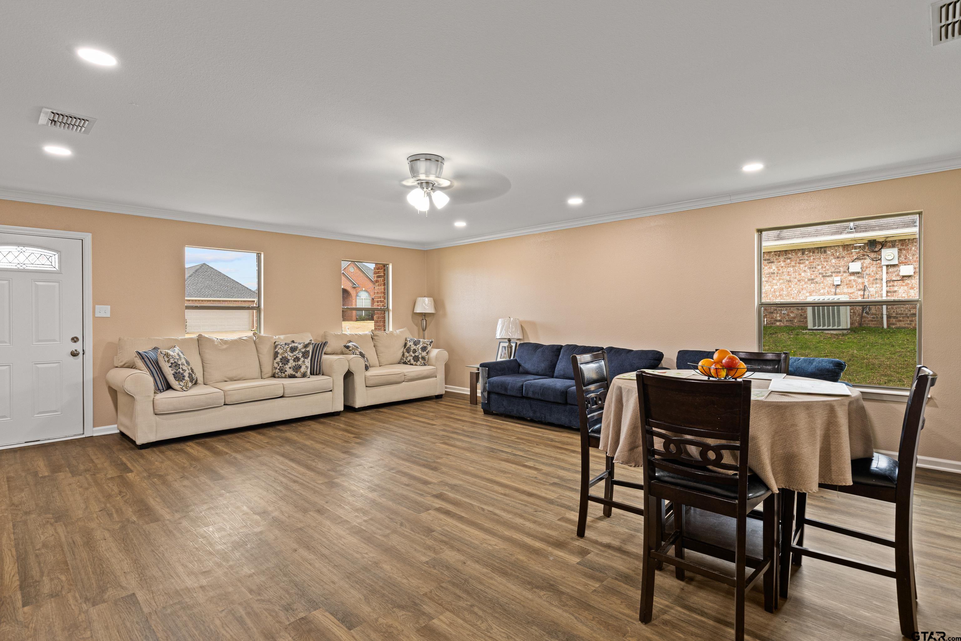 553 Princess Place Tyler, TX 75704 - Photo 14 of 32 a living room with furniture and a large window