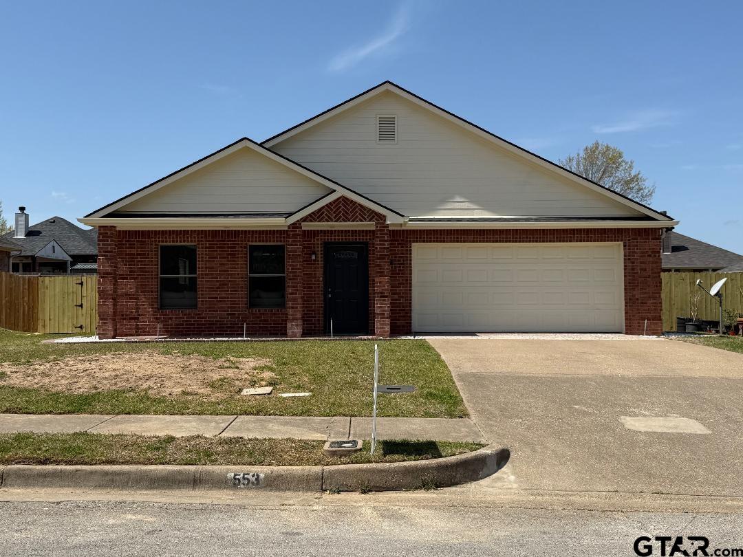 553 Princess Place Tyler, TX 75704 - Photo 3 of 32 a front view of a house