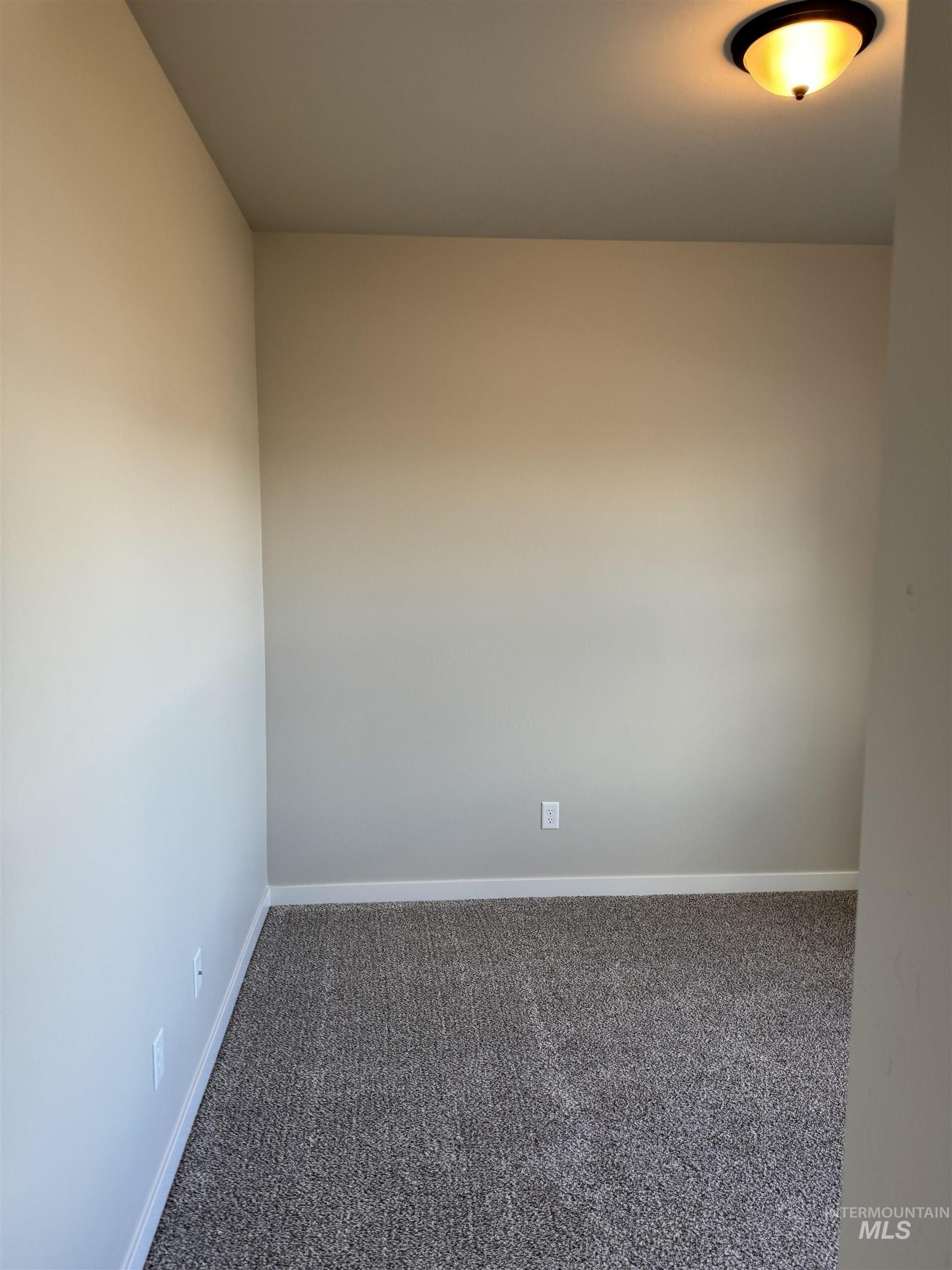 2064 Harrison Street South Twin Falls, ID 83301 - Photo 10 of 29 Empty room with carpet and baseboards