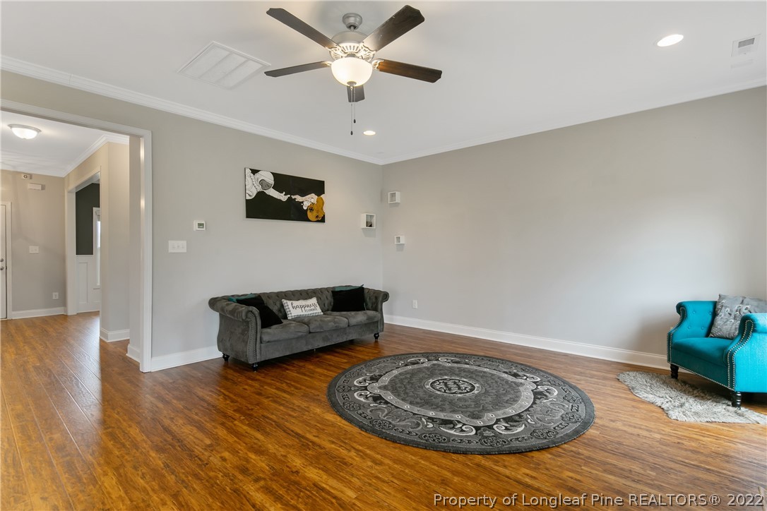 5213 Bree Bridge Road Hope Mills, NC 28348 - Photo 14 of 50 a living room with furniture and a rug