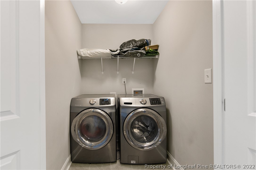 5213 Bree Bridge Road Hope Mills, NC 28348 - Photo 44 of 50 a utility room with dryer and washer