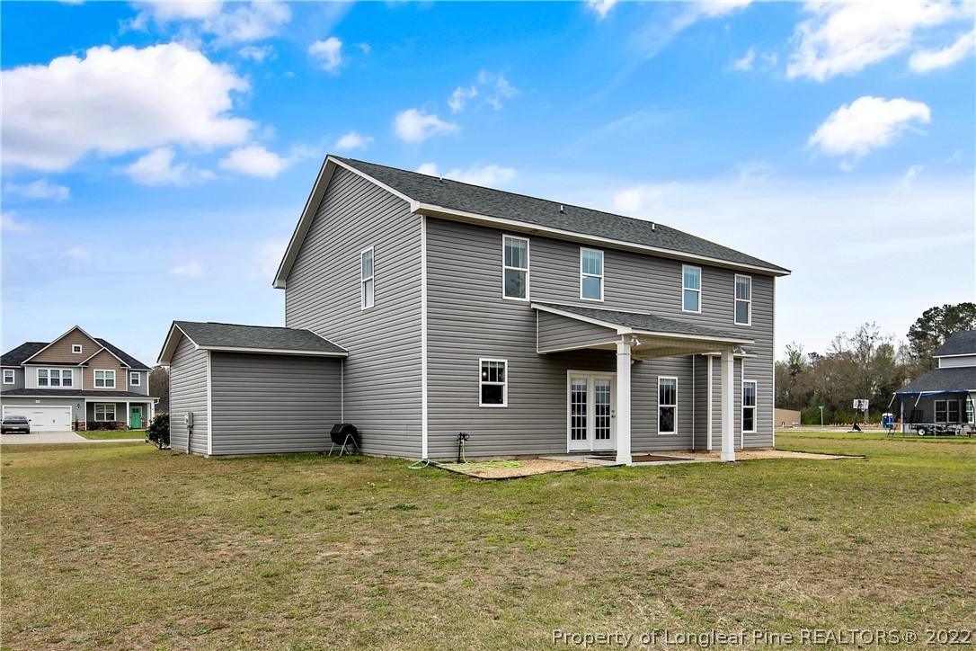 5213 Bree Bridge Road Hope Mills, NC 28348 - Photo 50 of 50 a house view with a garden space