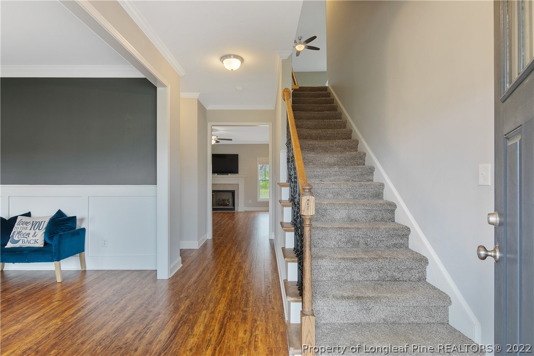 5213 Bree Bridge Road Hope Mills, NC 28348 - Photo 5 of 50 a view of entryway and hall with wooden floor