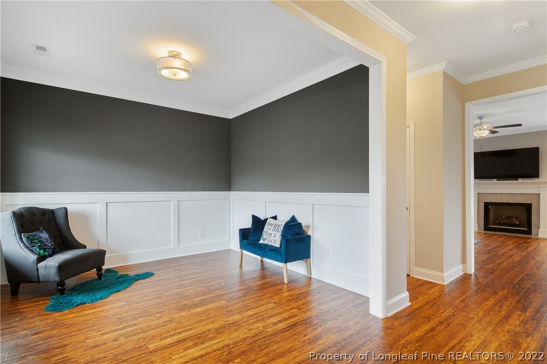 5213 Bree Bridge Road Hope Mills, NC 28348 - Photo 6 of 50 a living room with furniture and a wooden floor