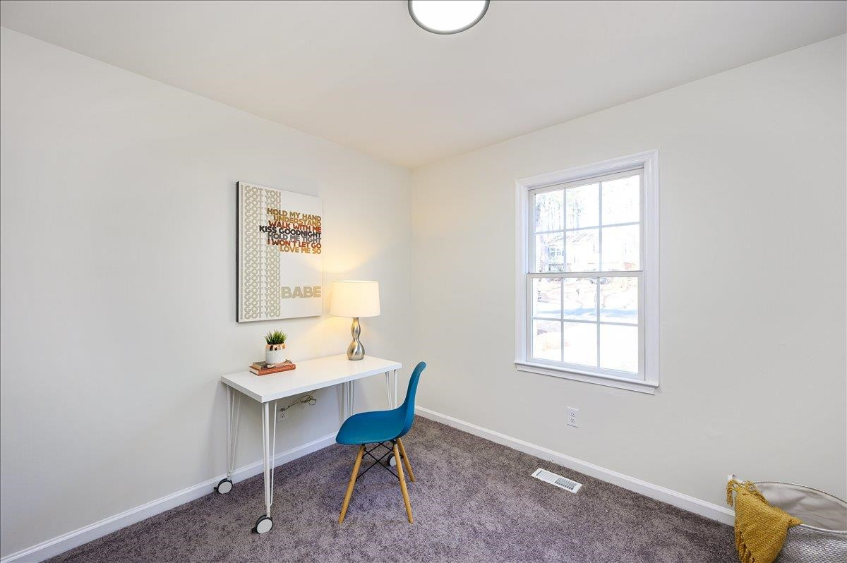 5506 McCormick Road Durham, NC 27713 - Photo 26 of 28 a view of a dining room with furniture and window