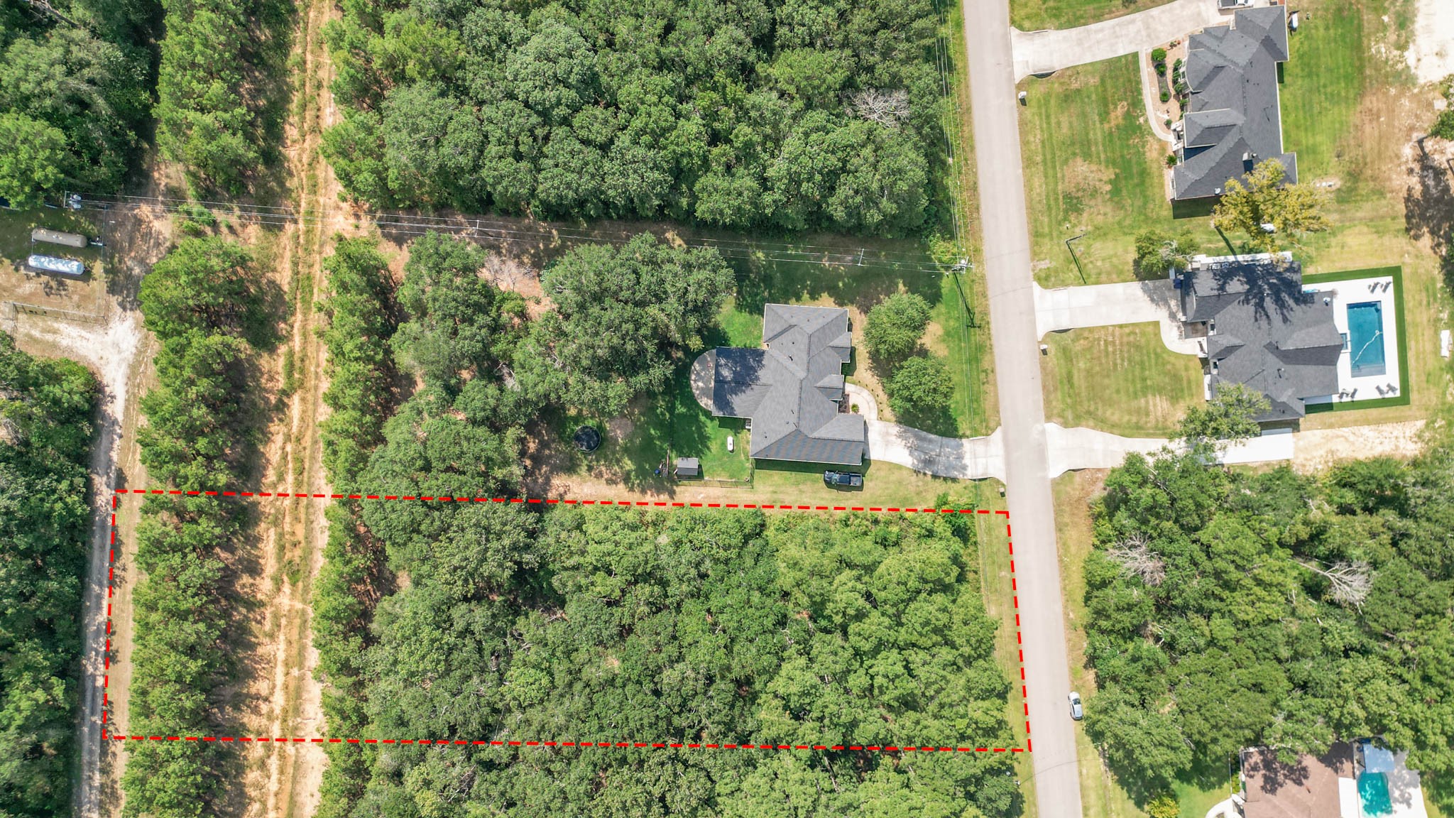 27542 Rio Blanco Drive Splendora, TX 77372 - Photo 12 of 19 an aerial view of a house with a yard and lake view