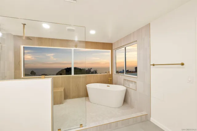 a terrace of a house with outdoor seating