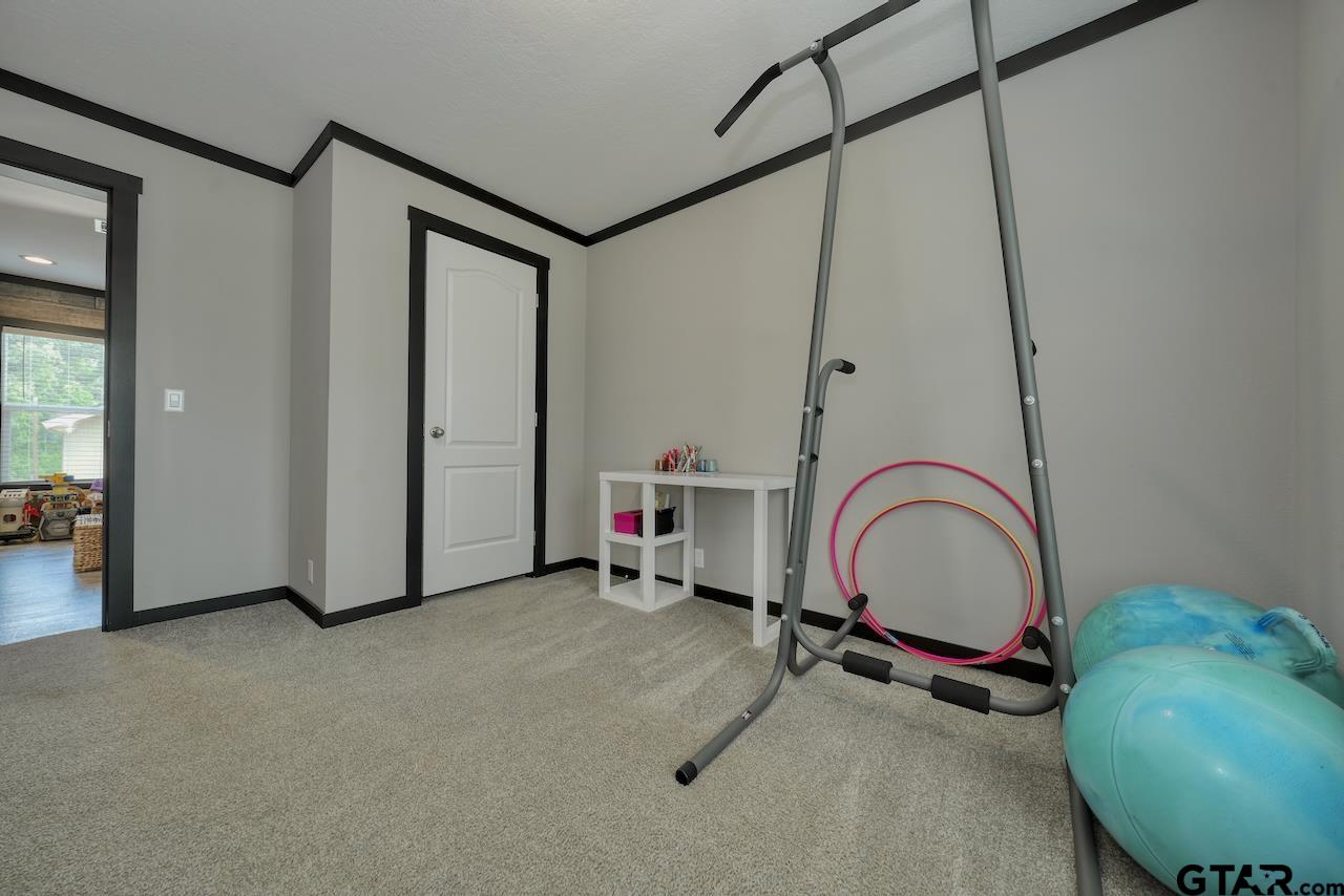 17675 Pine Drive Lindale, TX 75771 - Photo 30 of 35 a view of a room with gym equipment