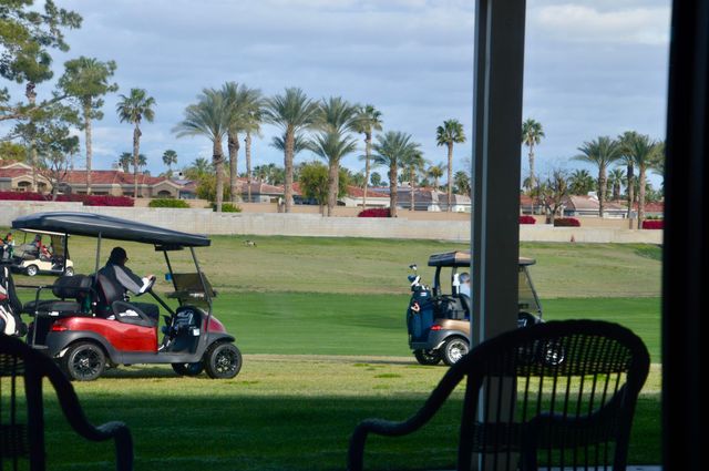 a view of a lake from a balcony