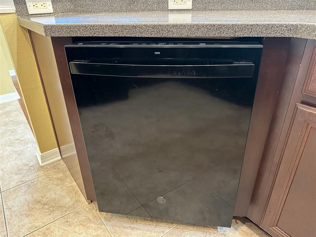 11801 Essington Street New Port Richey, FL 34654 - Photo 14 of 79 a close view of washer and dryer