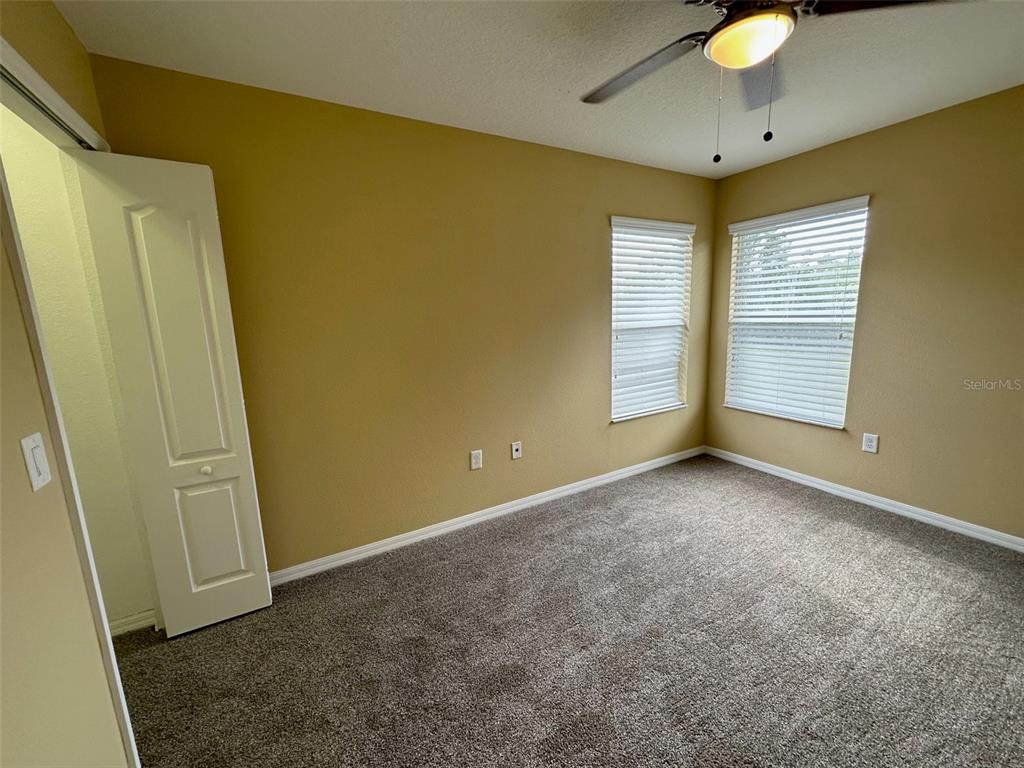 11801 Essington Street New Port Richey, FL 34654 - Photo 41 of 79 an empty room with a window