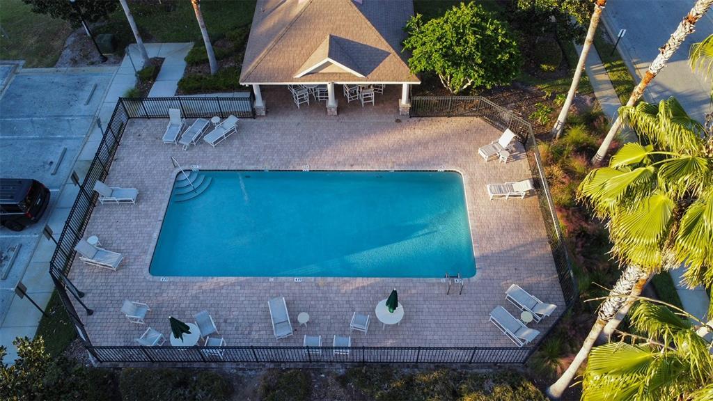 11801 Essington Street New Port Richey, FL 34654 - Photo 62 of 79 an aerial view of a house with table and chairs