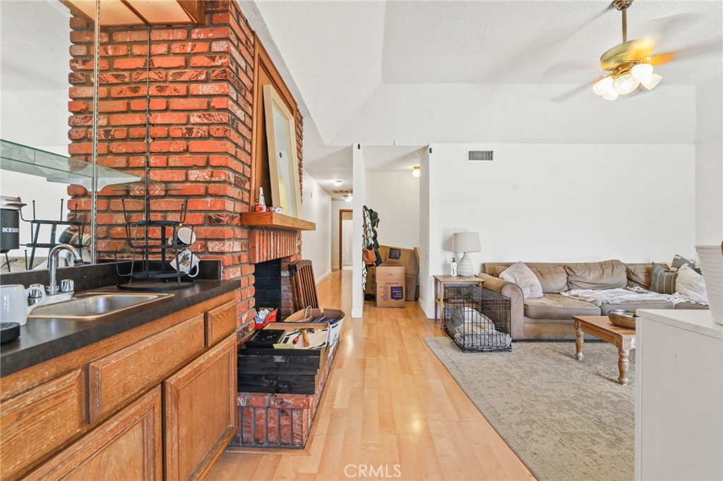 14 Thunder Trail, Unit 28 Irvine, CA 92614 - Photo 16 of 60 a living room with furniture fireplace and flat screen tv