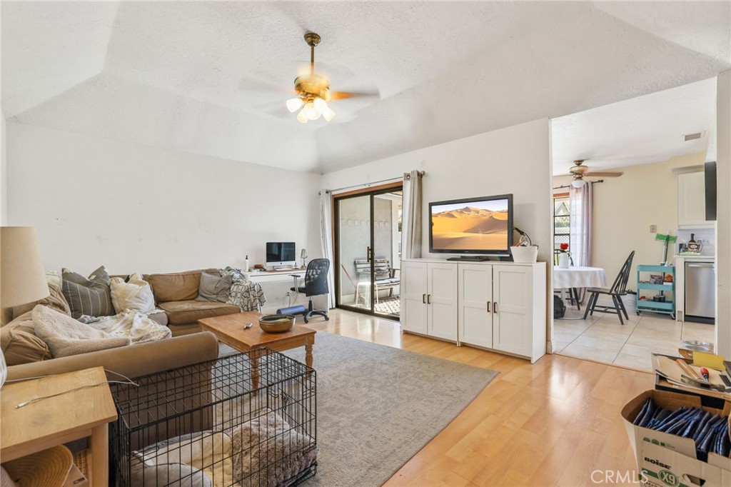 14 Thunder Trail, Unit 28 Irvine, CA 92614 - Photo 18 of 60 a living room with furniture and a flat screen tv