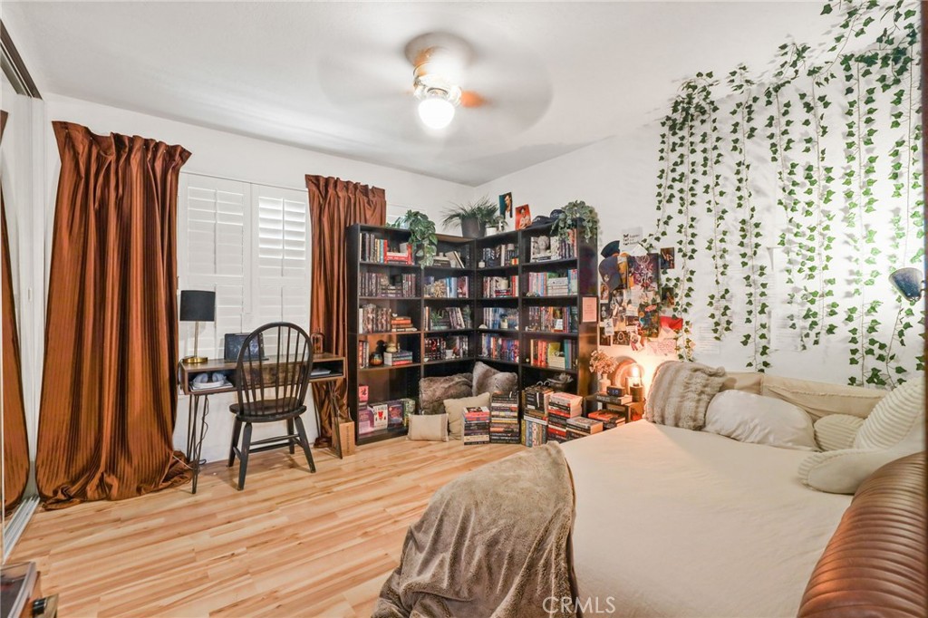 14 Thunder Trail, Unit 28 Irvine, CA 92614 - Photo 22 of 60 a bed room with a bed and a chair