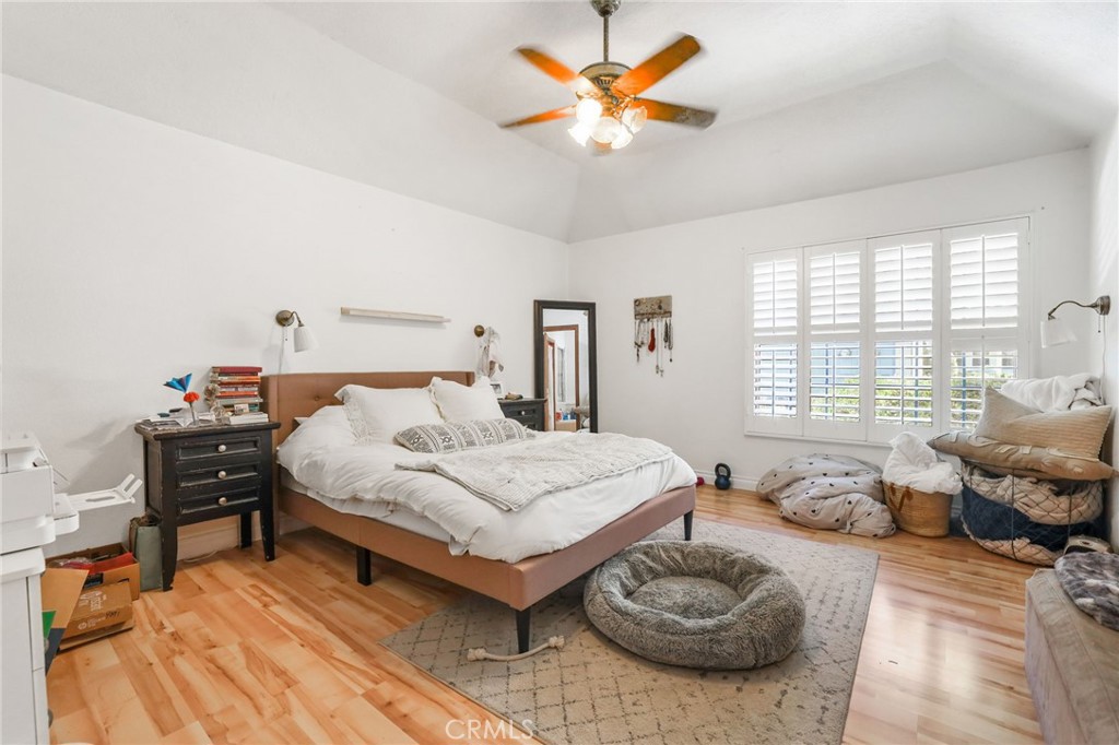 14 Thunder Trail, Unit 28 Irvine, CA 92614 - Photo 24 of 60 a bedroom with a bed and a table chair with outer view