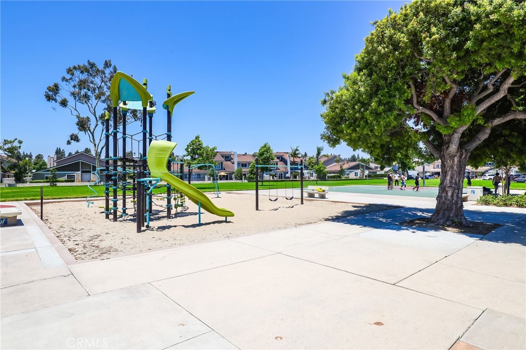 14 Thunder Trail, Unit 28 Irvine, CA 92614 - Photo 39 of 60 a view of a park with swings and slides