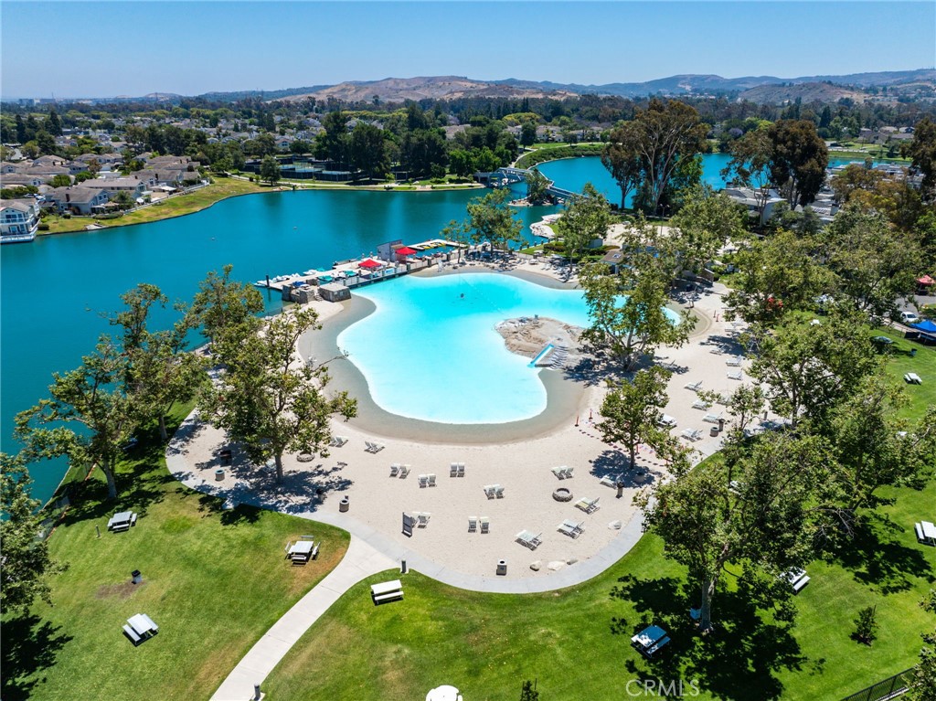 14 Thunder Trail, Unit 28 Irvine, CA 92614 - Photo 43 of 60 an aerial view of a house with a garden and lake view