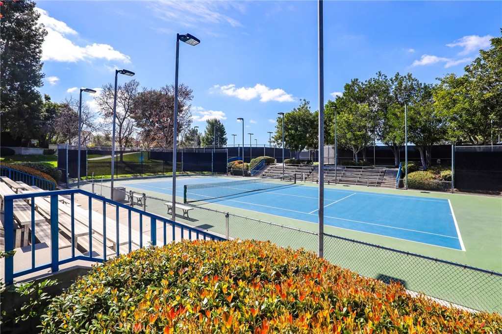 14 Thunder Trail, Unit 28 Irvine, CA 92614 - Photo 50 of 60 a view of a pathway with a bench in front of it