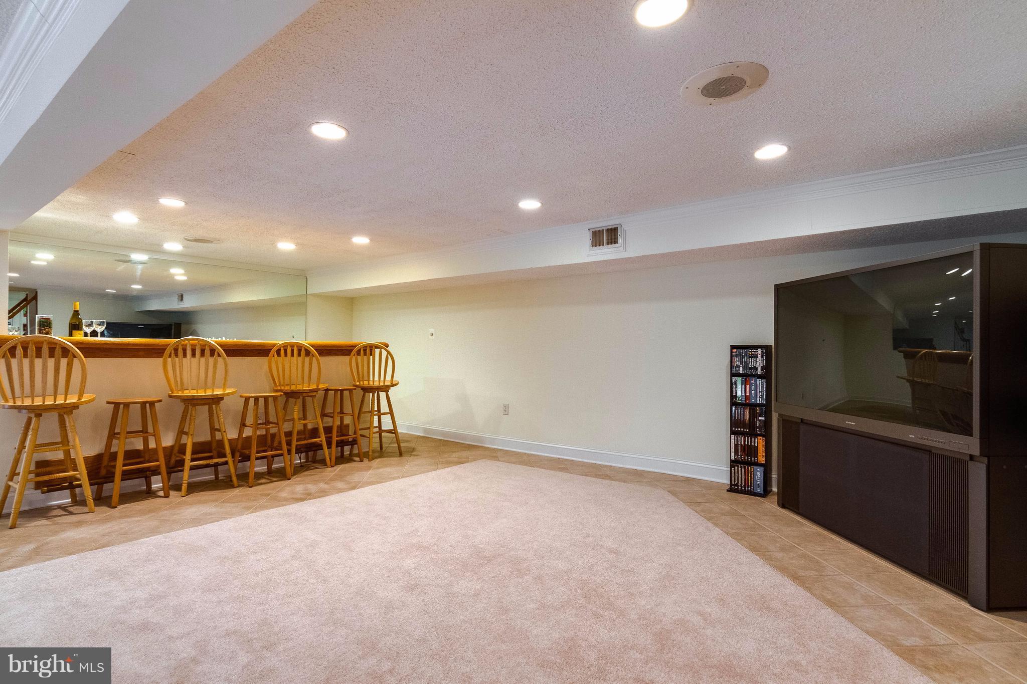 18348 Sharon Road Triangle, VA 22172 - Photo 21 of 30 Rec. room in basement. TV and system convey