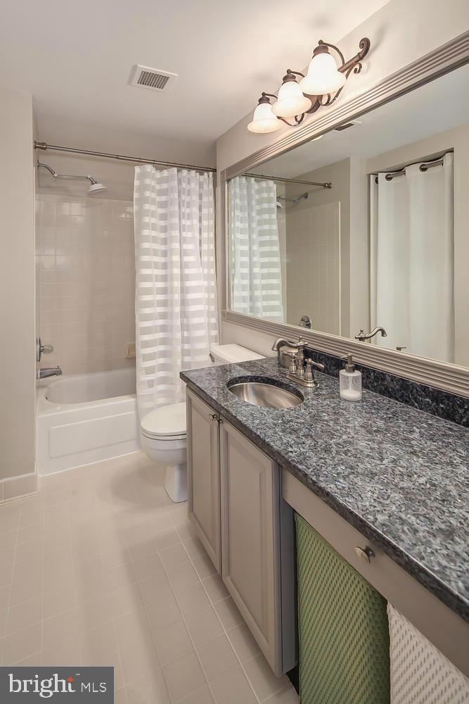 545 East Braddock Road, Unit 101 Alexandria, VA 22314 - Photo 36 of 46 Modern bathroom with sleek finishes.