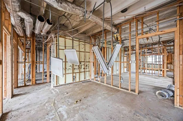 a view of a room with wooden walls