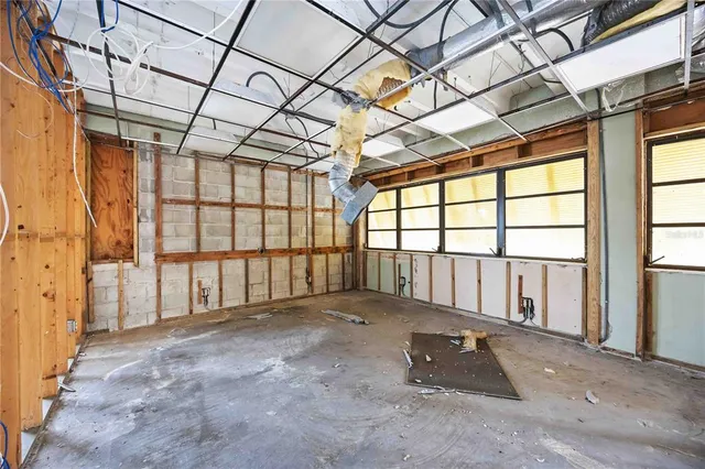 a view of an empty room with a window