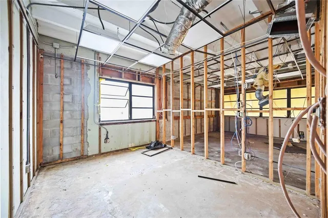 an empty room with windows