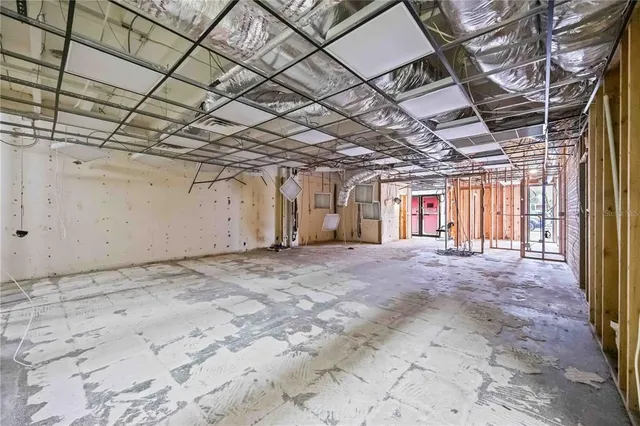 a view of a room with wooden walls