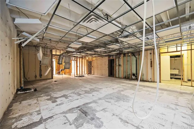 a view of a room with wooden walls