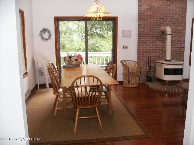 826 Hampstead Road Bushkill, PA 18324 - Photo 3 of 18 a view of a dining room with furniture window and outside view