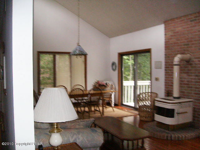 826 Hampstead Road Bushkill, PA 18324 - Photo 5 of 18 a dining room with furniture and wooden floor