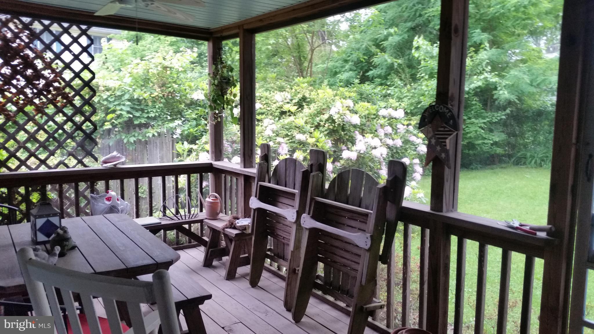 1305 4th Road Baltimore, MD 21220 - Photo 17 of 24 a view of a balcony with chairs