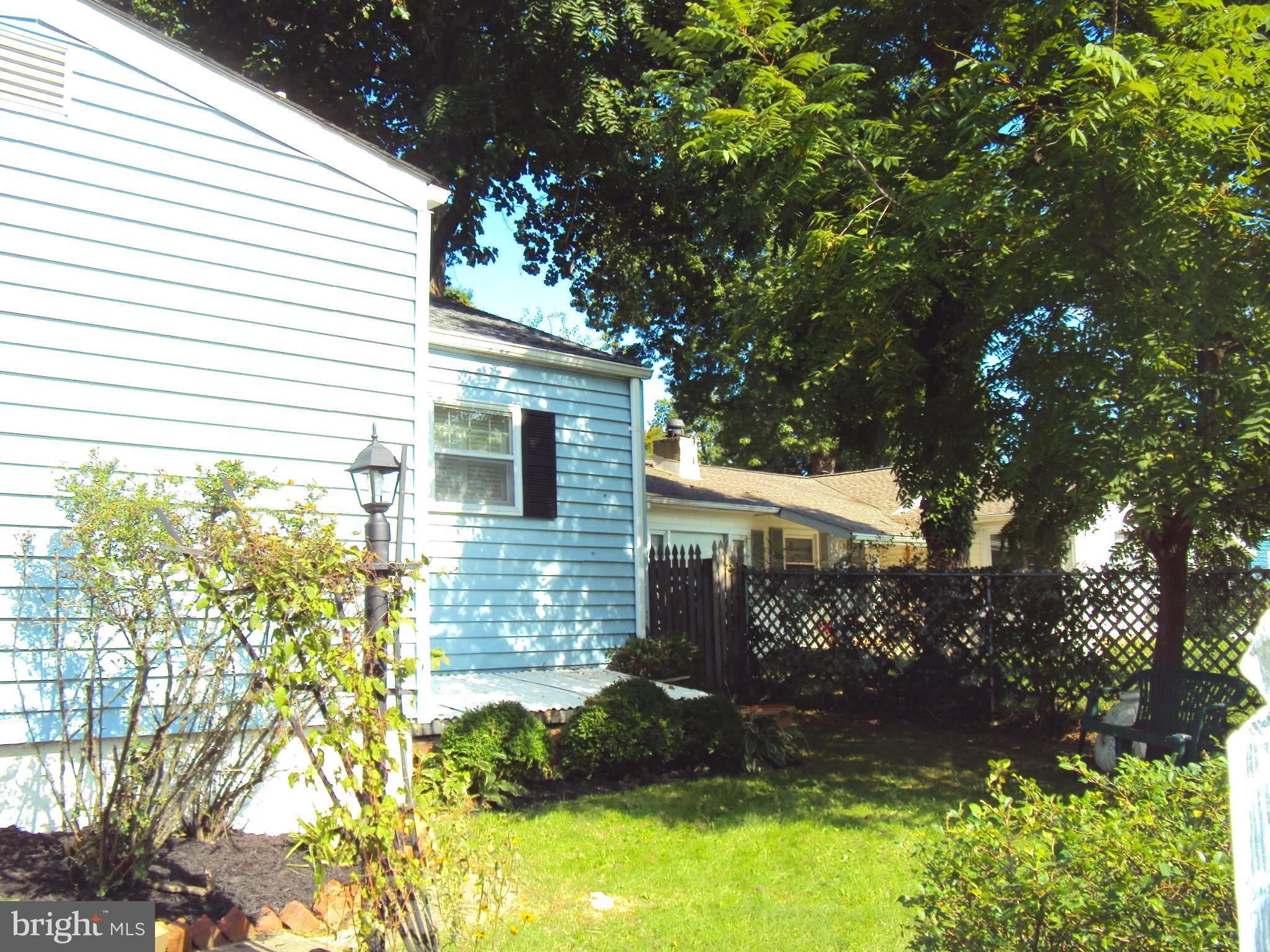1305 4th Road Baltimore, MD 21220 - Photo 24 of 24 a view of house with backyard