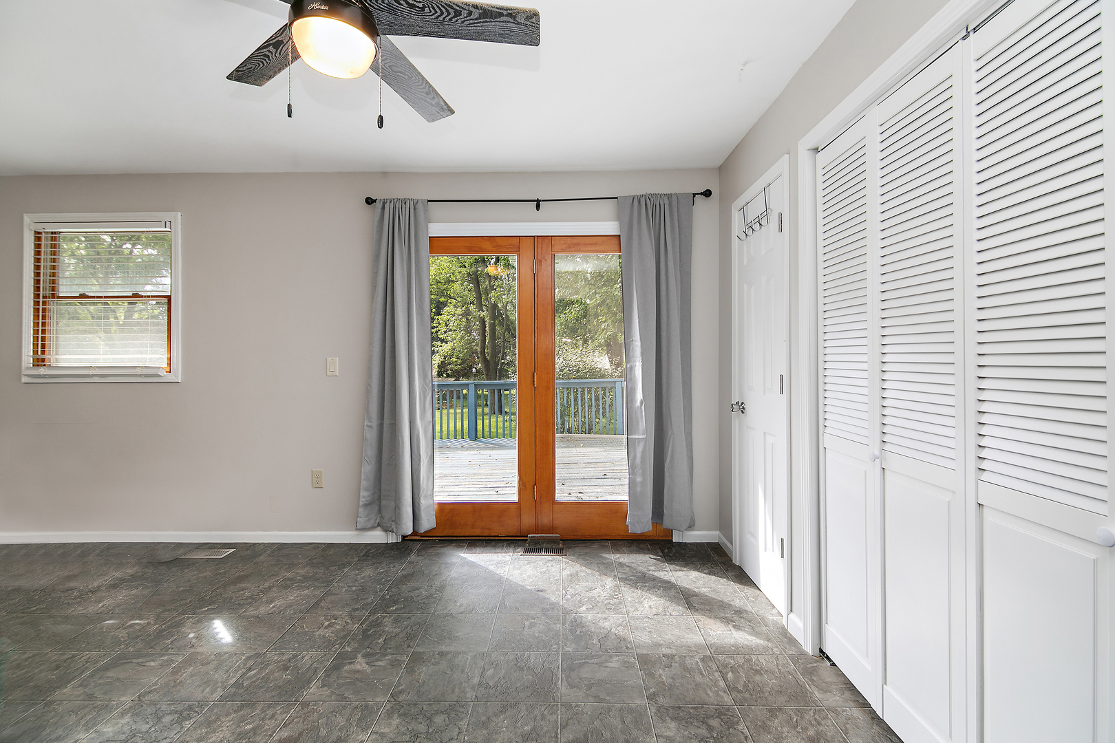 3926 East Chestnut Street Kankakee, IL 60901 - Photo 4 of 14 a view of an empty room with a window