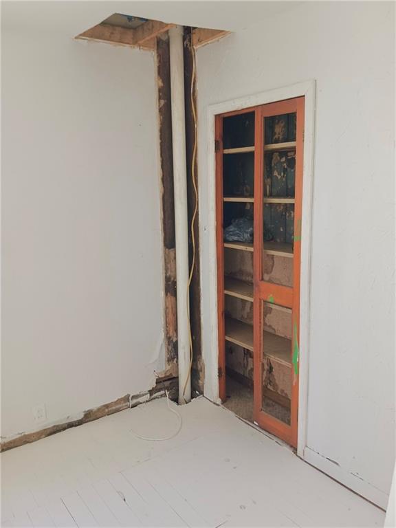 633 5th Avenue Ford City, PA 16226 - Photo 12 of 18 a view of an empty room with a empty space and a window