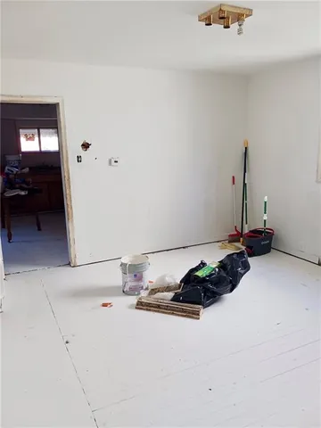 a bathroom with a sink toilet and a mirror